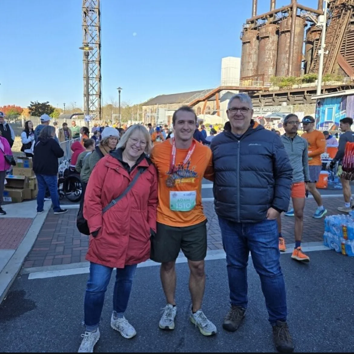 Finish line with Mom and Dad
